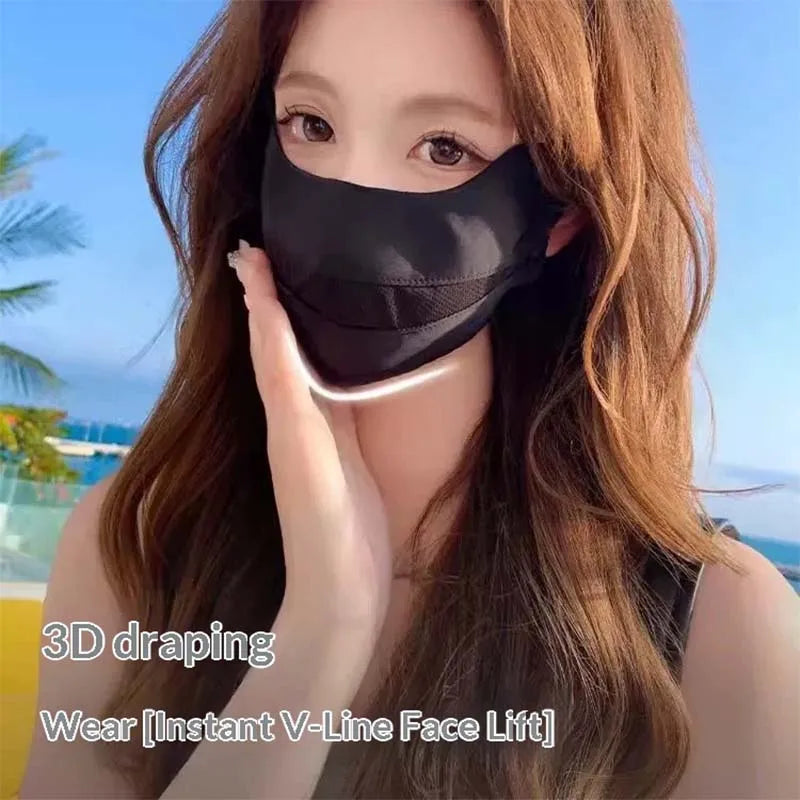 A woman models a black draping face mask for an instant V-line face lift treatment.