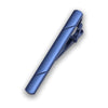 A close-up view of a polished blue 14K copper classic tie clip jewelry piece.