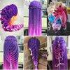 A collection of vibrant purple and pink hair extensions and braids displayed on mannequin heads.