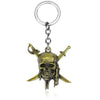 A gold skull pendant necklace with a silver hoop and bail.