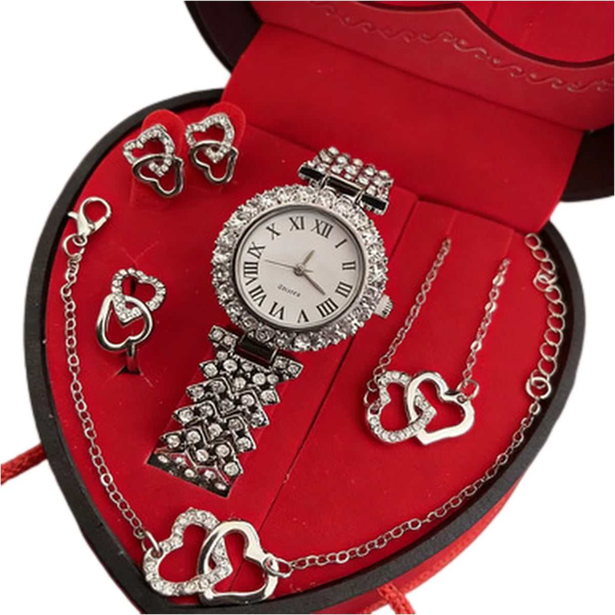 A red jewelry box containing a rhinestone heart-shaped women's jewelry set including a watch and necklaces.