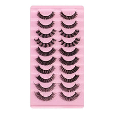 A pink plastic tray holding several rows of dramatic mink false eyelashes