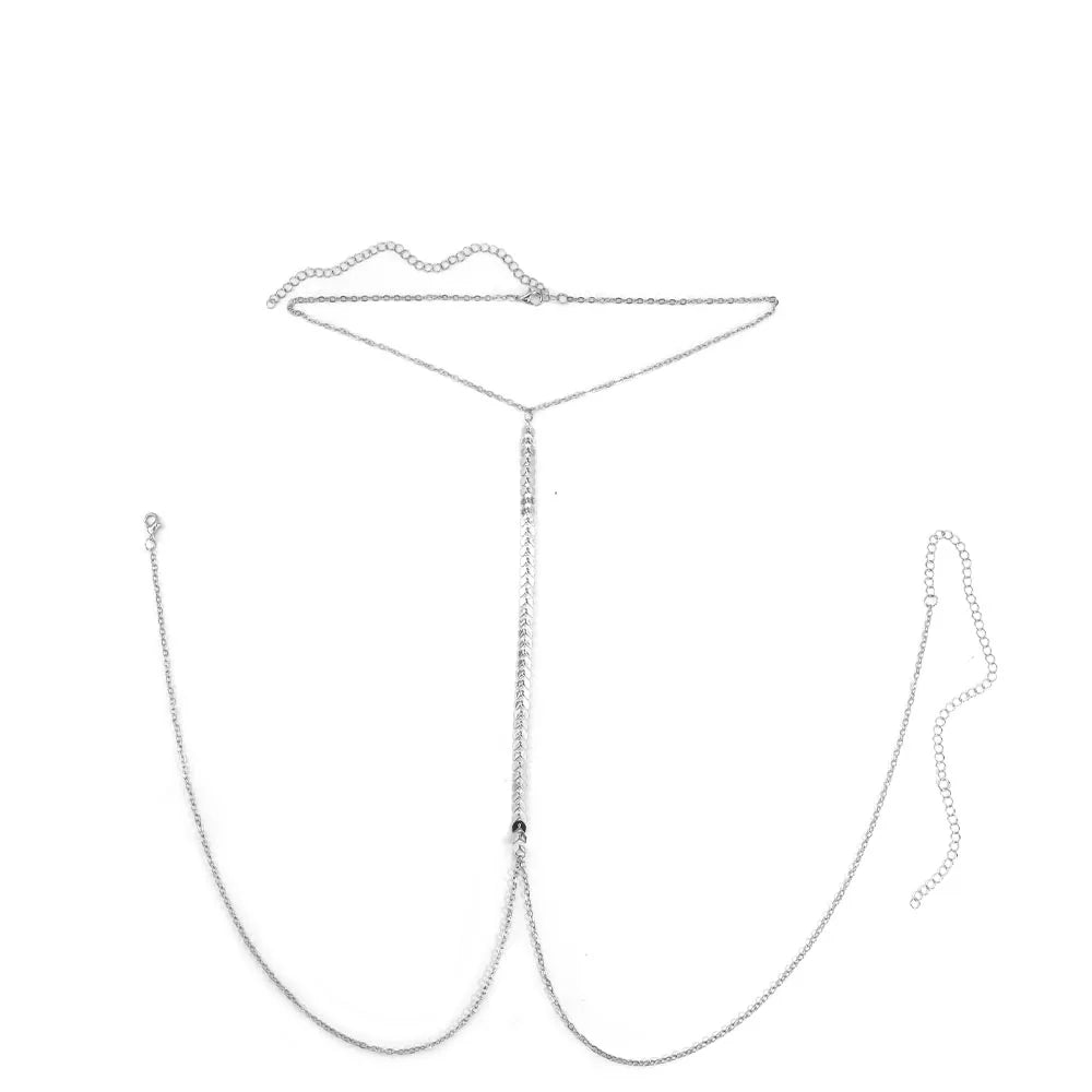 A delicate silver minimalist wheat body chain necklace displayed against a white background.
