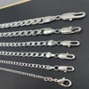A collection of silver geometric face chain necklaces featuring various link styles and clasps.