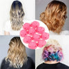 A set of pink heatless magic hair curlers shown in various shades and usage examples on hair.