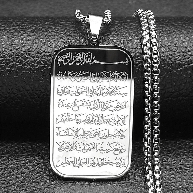 Silver pendant necklace featuring Arabic calligraphy of Ayatul Kursi on a black leather background.
