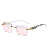 Frameless gradient sunglasses with a white frame and gold and marbled acetate arms