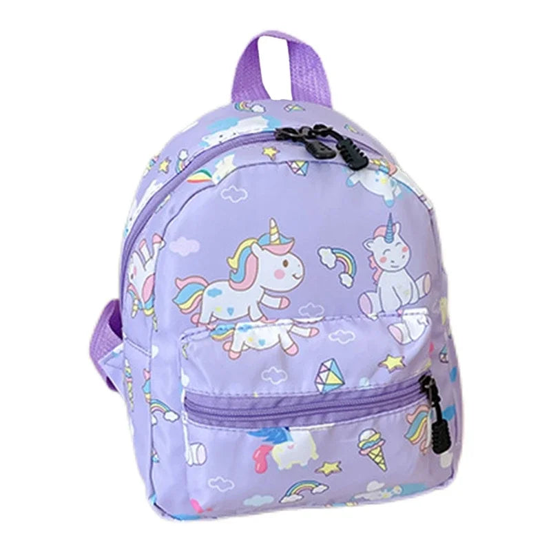 A purple kids backpack featuring a cute dinosaur and unicorn pattern.