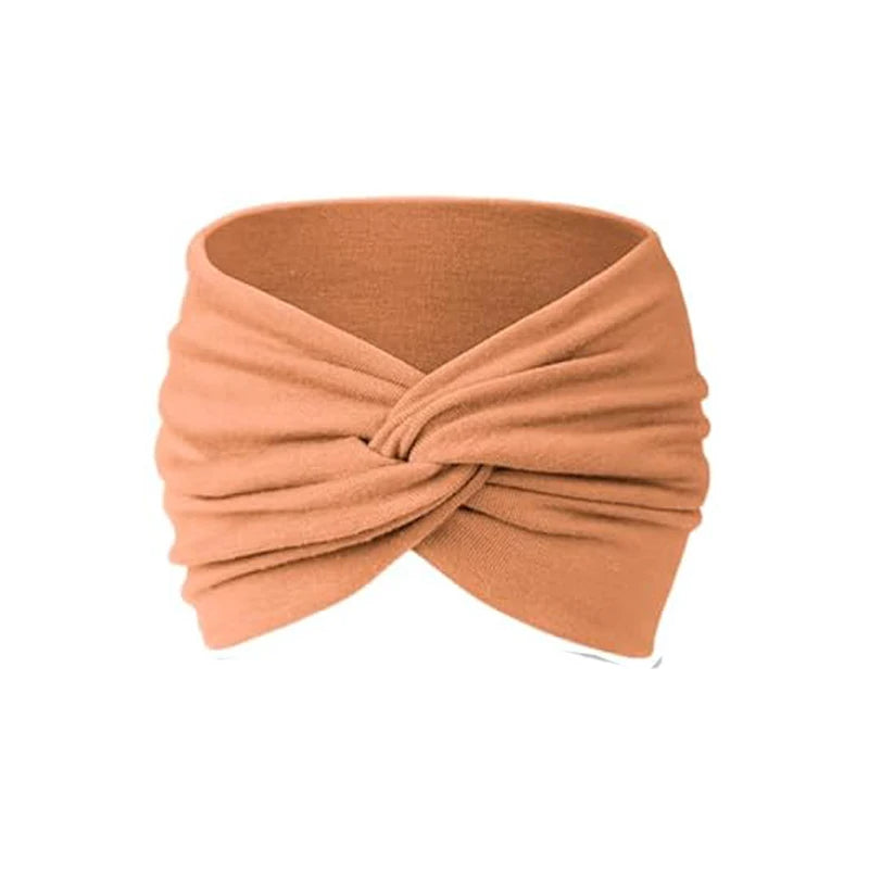 A beige knitted headband with a bohemian pattern for yoga and sports
