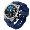 A blue digital sports watch with a silver bezel displaying time, date, and mode options.