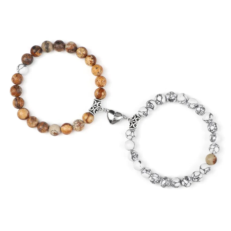 A pair of natural stone heart couple bracelets made of various brown and tan stones.
