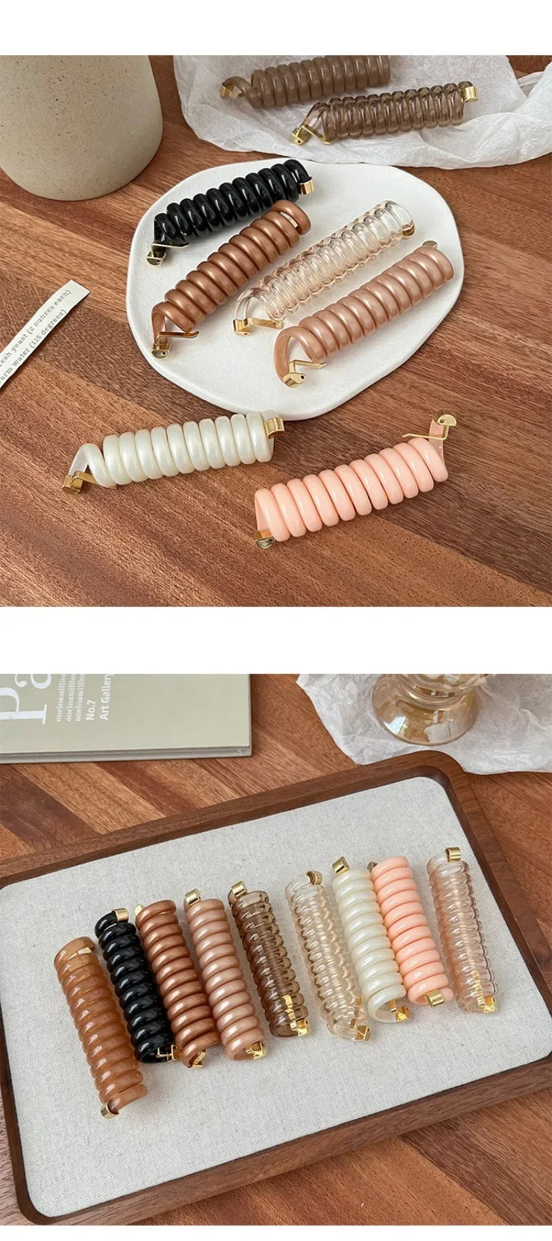 A set of rubber braided ponytail holders and scrunchies in various shades of brown, beige, and pink arranged on a white plate