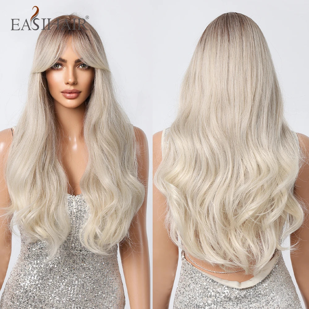 A model showcases a long, wavy sandy blonde wig with bangs against a light background.