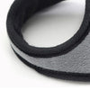 A close-up view of black and gray plush winter earmuffs designed for cold weather protection.