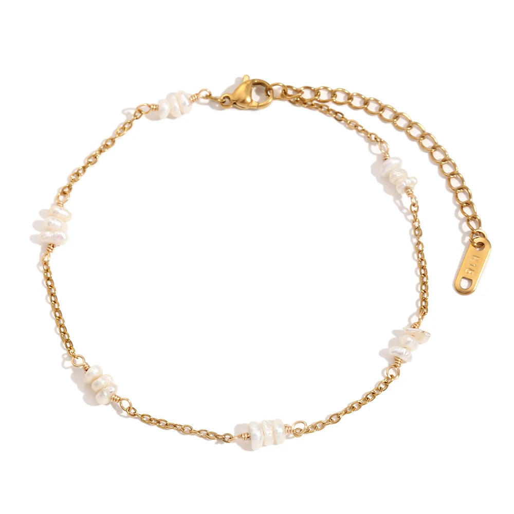 Gold plated foot chains with white beads and a gold clasp
