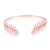Rose gold leaf headband with delicate floral accents for bridal or party wear