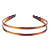 A pair of brown zigzag headband hair combs for face concealment.