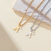 Two necklaces featuring initial letters A in gold and silver chains displayed on a light background.
