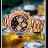 A close-up of a men's gold quartz watch with diamond accents resting on a golden surface.