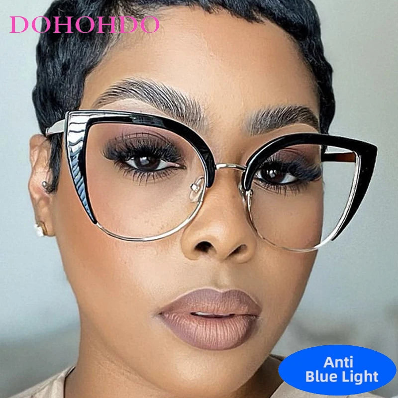 A close-up photo of a woman wearing vintage metal cat eye anti-blue light eyeglasses.