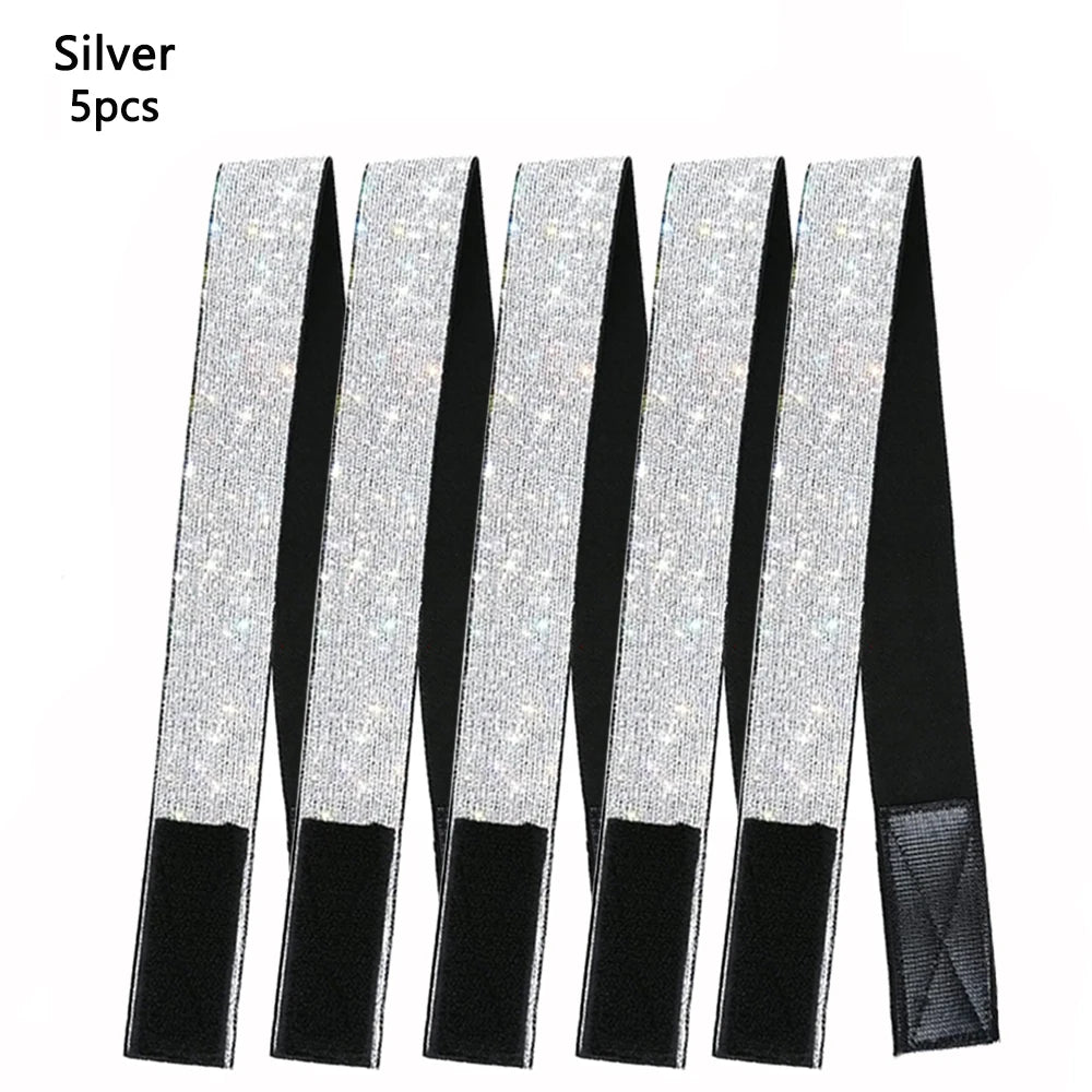Five silver adjustable lace headbands for wigs and scarves displayed against a black background.