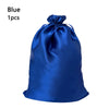 A royal blue satin drawstring storage bag for hair tools.