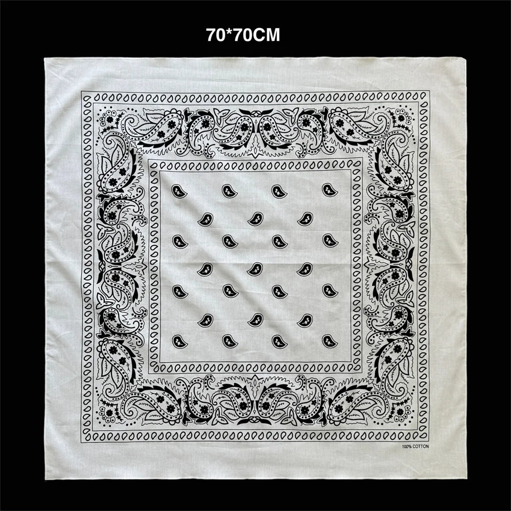 White cotton bandana scarf featuring a black paisley print border and small dark motifs.