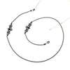 A delicate black metal link strap for securing eyeglasses or sunglasses.