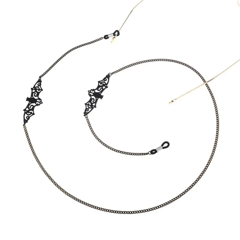 A delicate black metal link strap for securing eyeglasses or sunglasses.