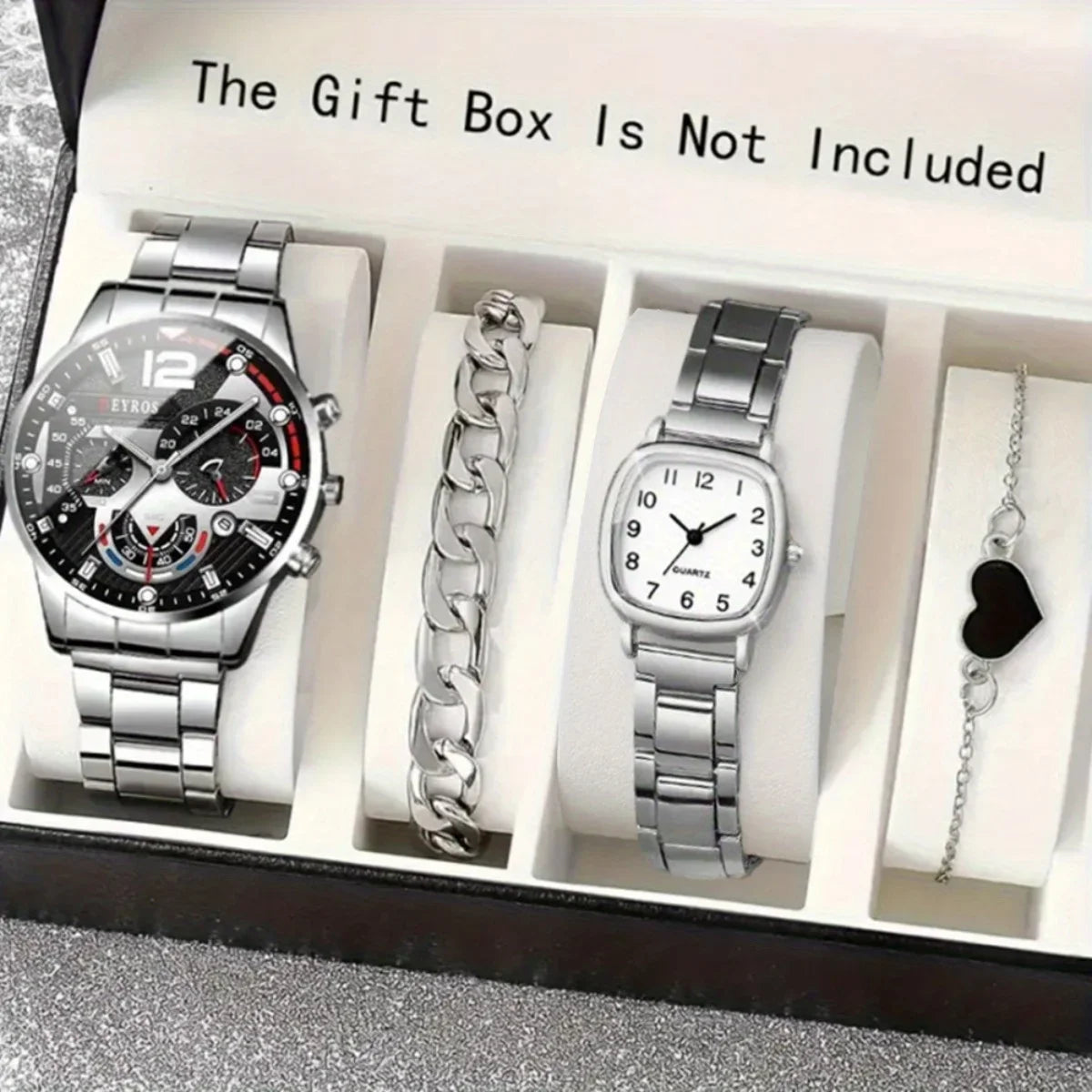 A gift box display showing a silver watch, a silver chain, and a silver pendant.
