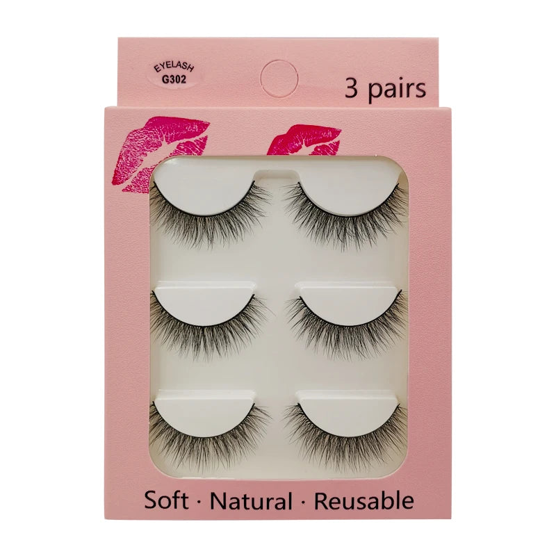 A box of 3 pairs of soft natural reusable mink strip eyelashes with a pink background.