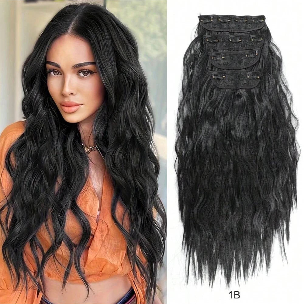 Una modelo muestra extensiones de cabello negro largo y ondulado, peinado con ondas sueltas y raya lateral.