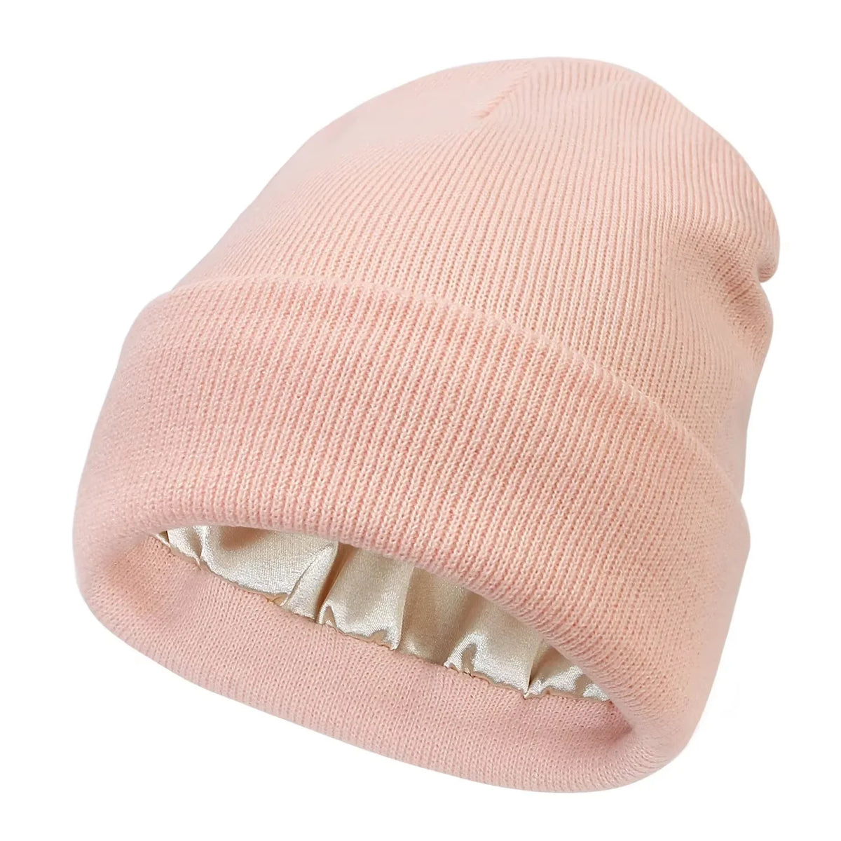 A light pink satin-lined beanie hat with a ribbed texture.