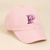 A pink baseball cap featuring a purple and white unicorn design.
