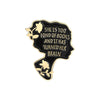 A black enamel lapel pin shaped like a brain with a floral design and text reading She is too fond of books and it has turned