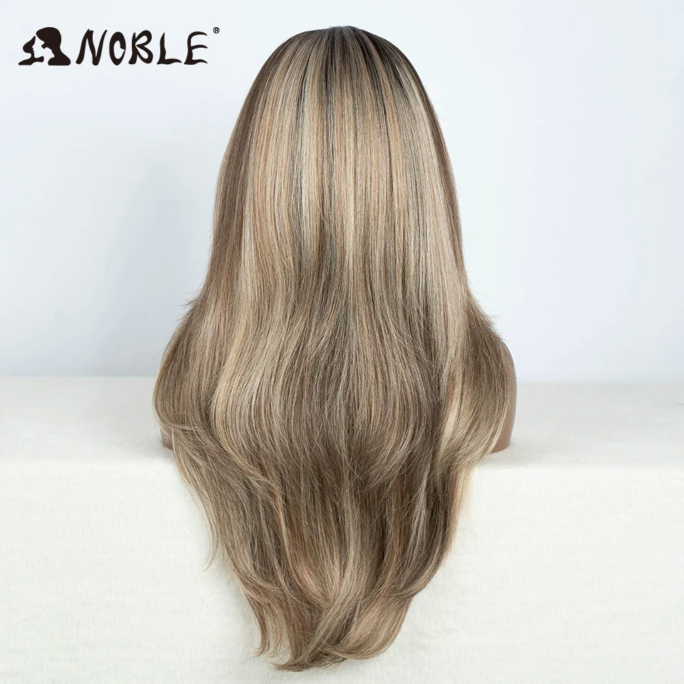 A long, straight ombre lace front wig with light brown and blonde highlights displayed against a white background.