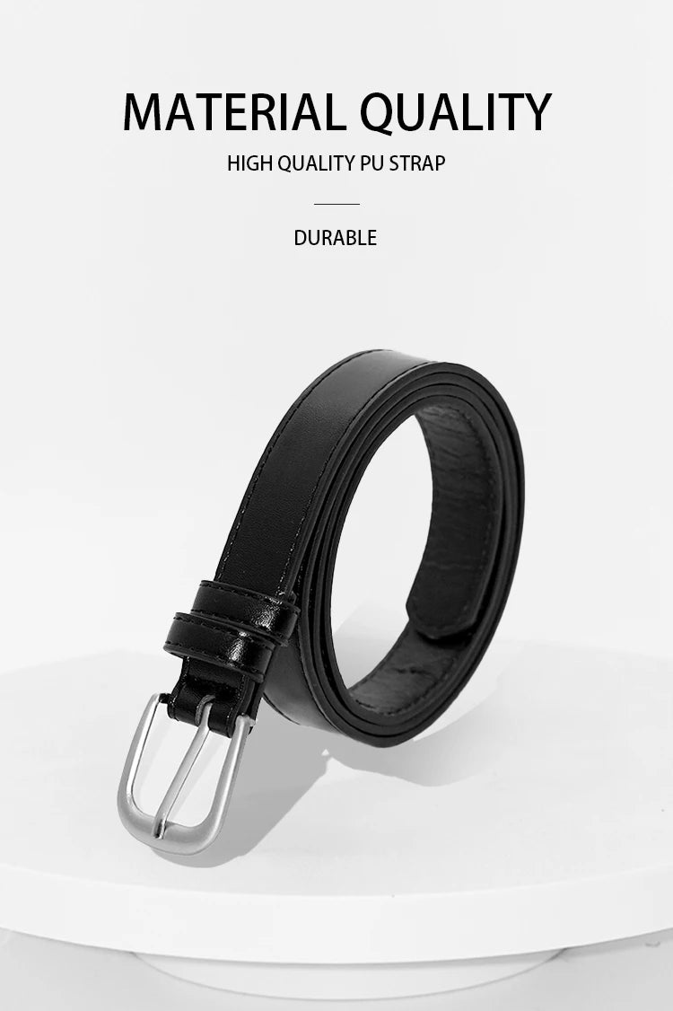 Black PU strap waist belt with a silver buckle shown on a white surface.