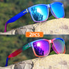 Pair of gradient square frame polarized sunglasses resting on a rocky surface.