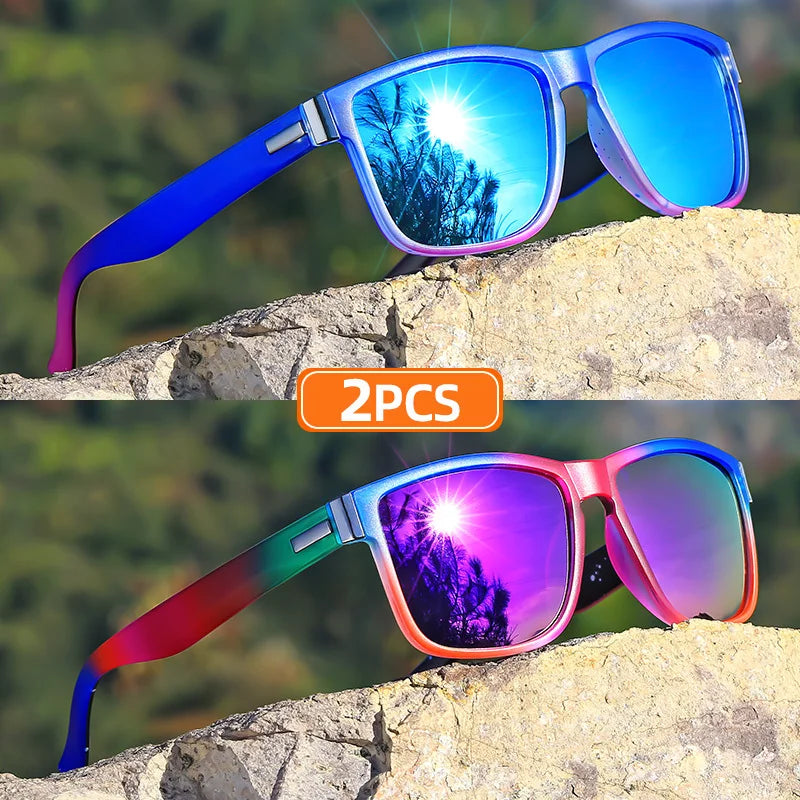 Pair of gradient square frame polarized sunglasses resting on a rocky surface.