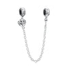 A silver family tree charm necklace featuring a detailed leaf design and a delicate chain.