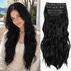 Long black wavy hair with a dark clip accessory displayed against a light background.