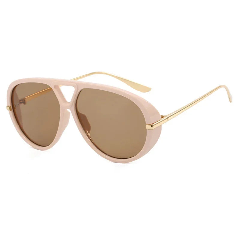 Light pink aviator style sunglasses with gold accents and brown lenses