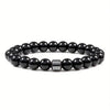 A black Tiger Eye lava map bracelet made of polished, round beads.