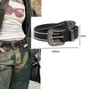 Black leather goth punk belt with silver bullet studs and buckle shown on a person's waist.