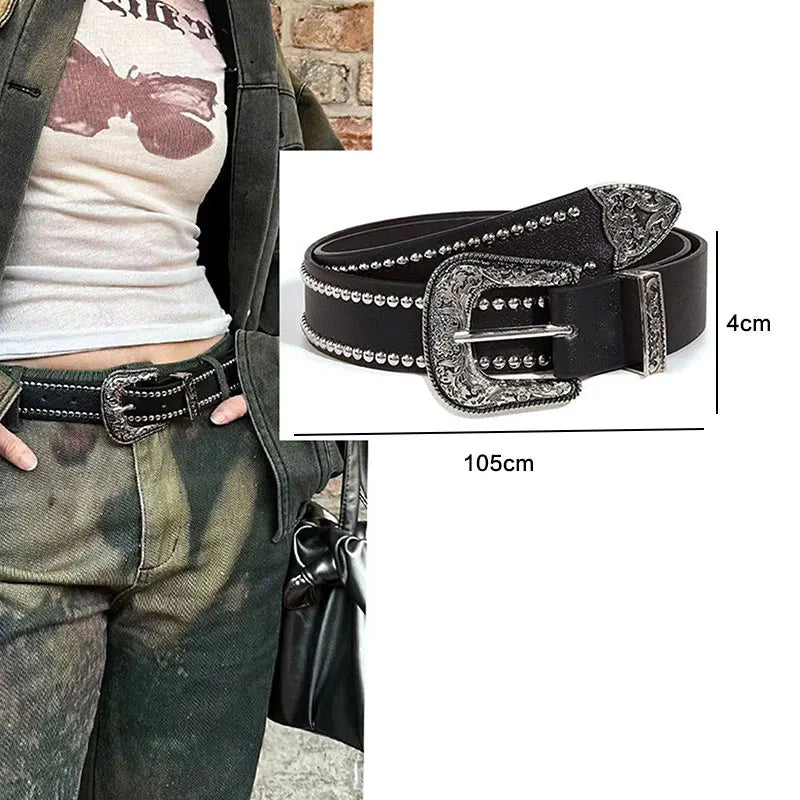 Black leather goth punk belt with silver bullet studs and buckle shown on a person's waist.