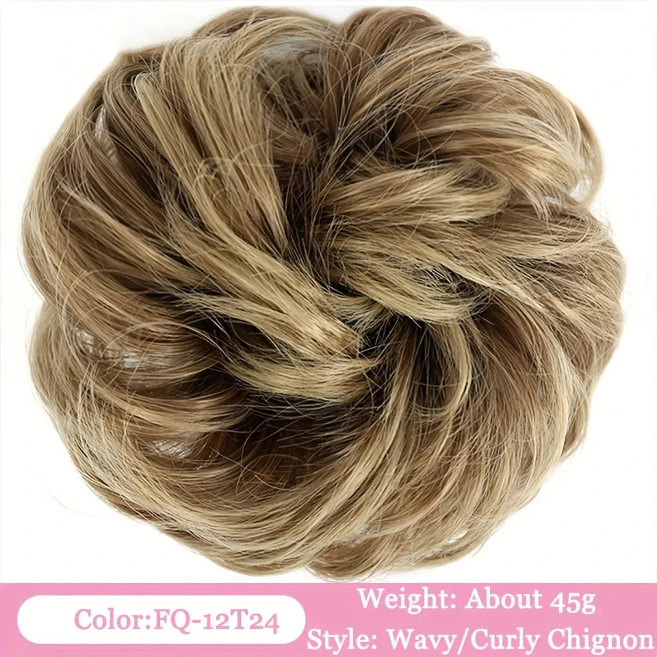 Ein Bund braunem, gewelltem Haar, zu einem Dutt mit Chignon-Bändern gestylt