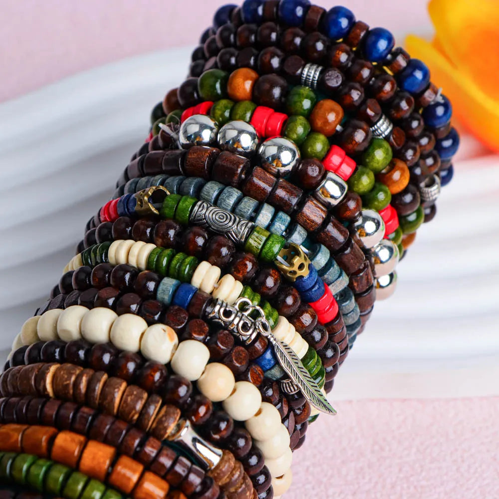 A stack of colorful fashion elastic wood bead bracelets with various natural and metallic beads.