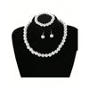 A necklace and matching earrings set of faux pearls displayed on a black jewelry stand.
