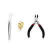 A set of jewelry findings including a silver pin, gold jump rings, and pliers.