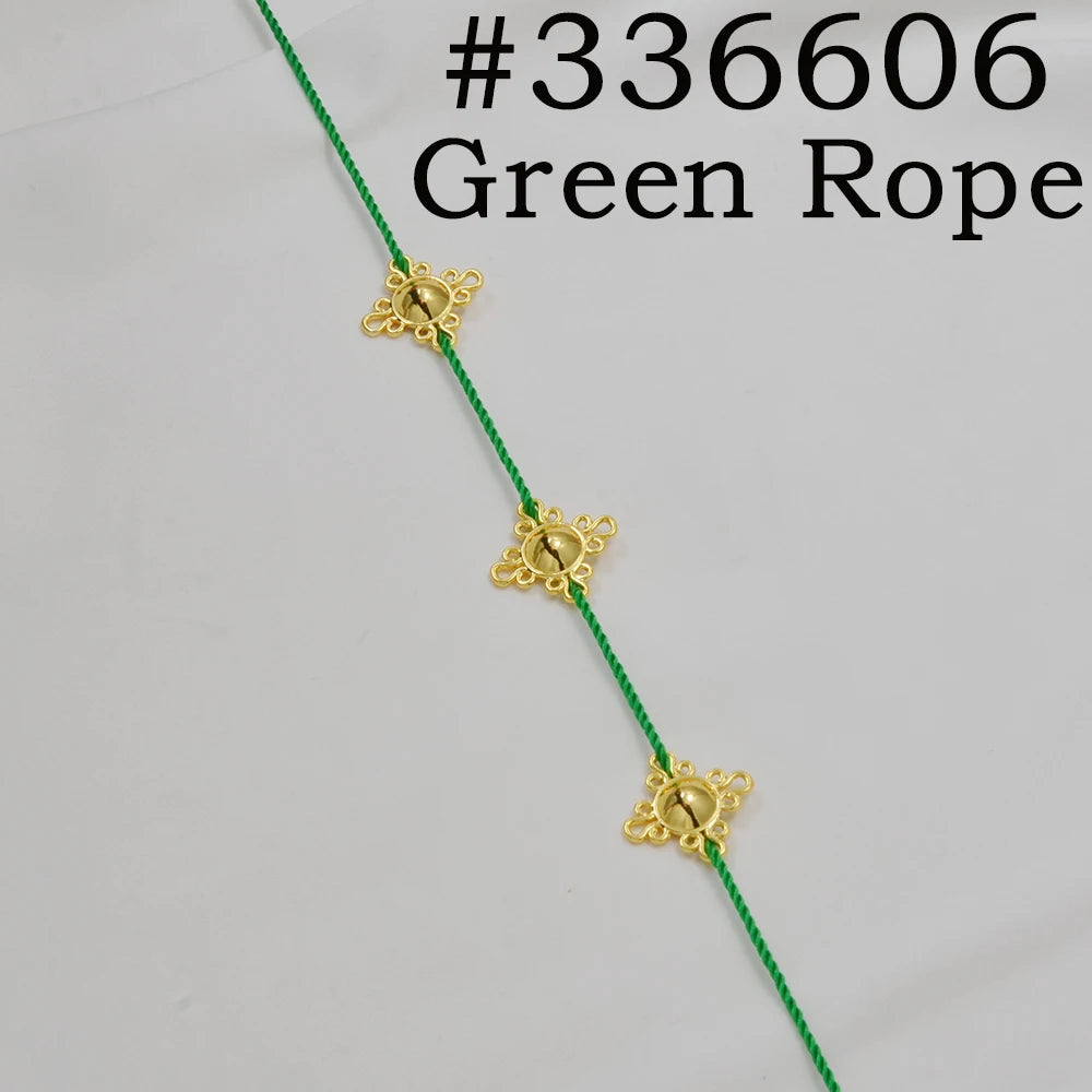 Green rope with three gold traditional Ethiopian head chains